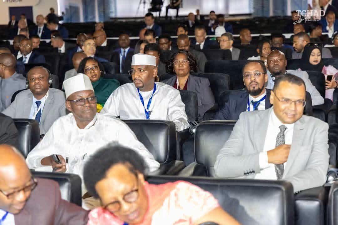 Participants dans la salle plénière du Forum